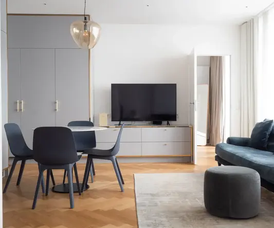 a living room with a tv and a couch