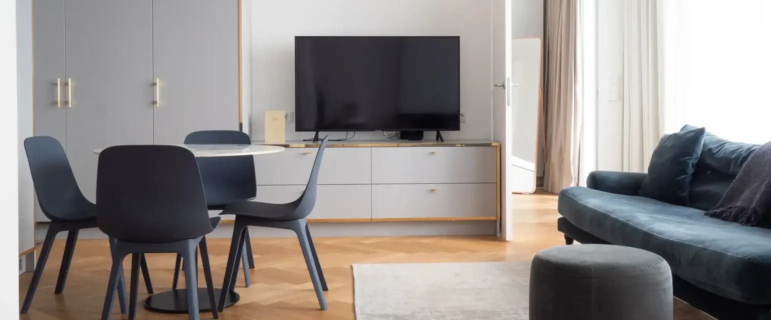 a living room with a tv and a couch