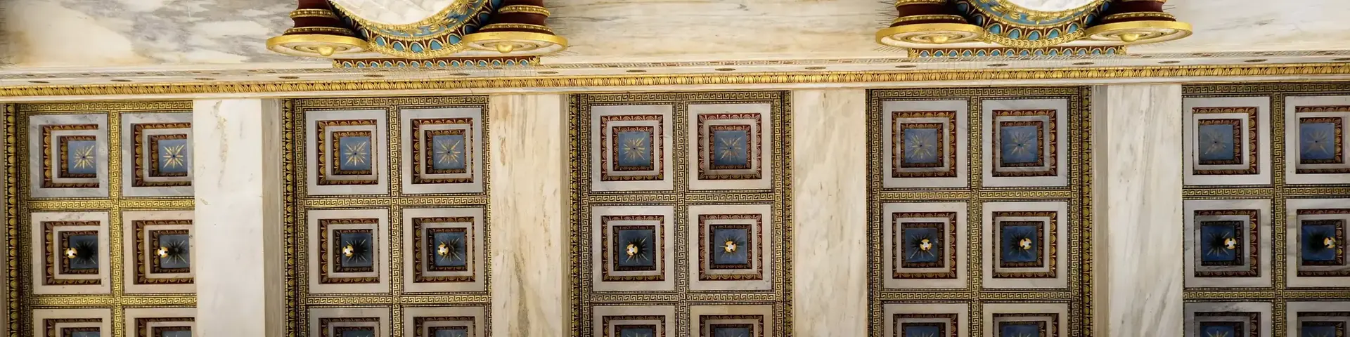 a ceiling of a building with columns