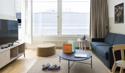 a living room with a couch and a coffee table