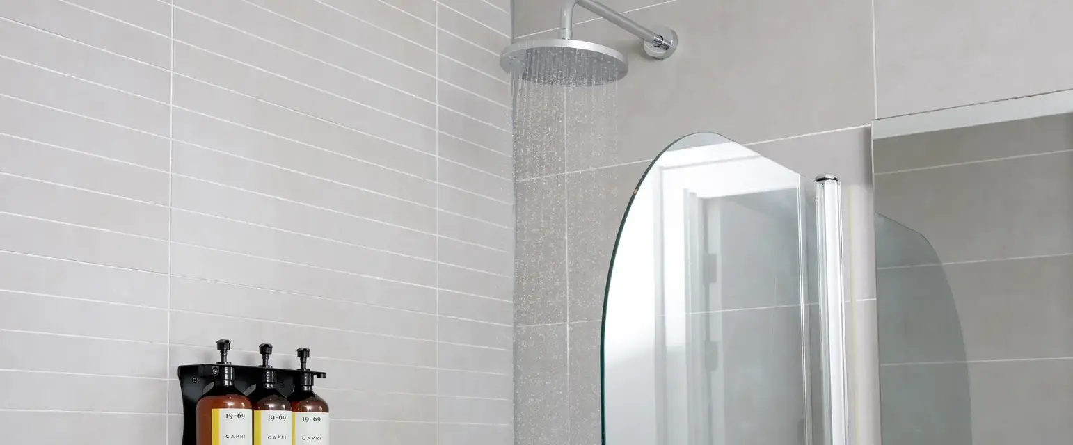 a shower head with water running from it