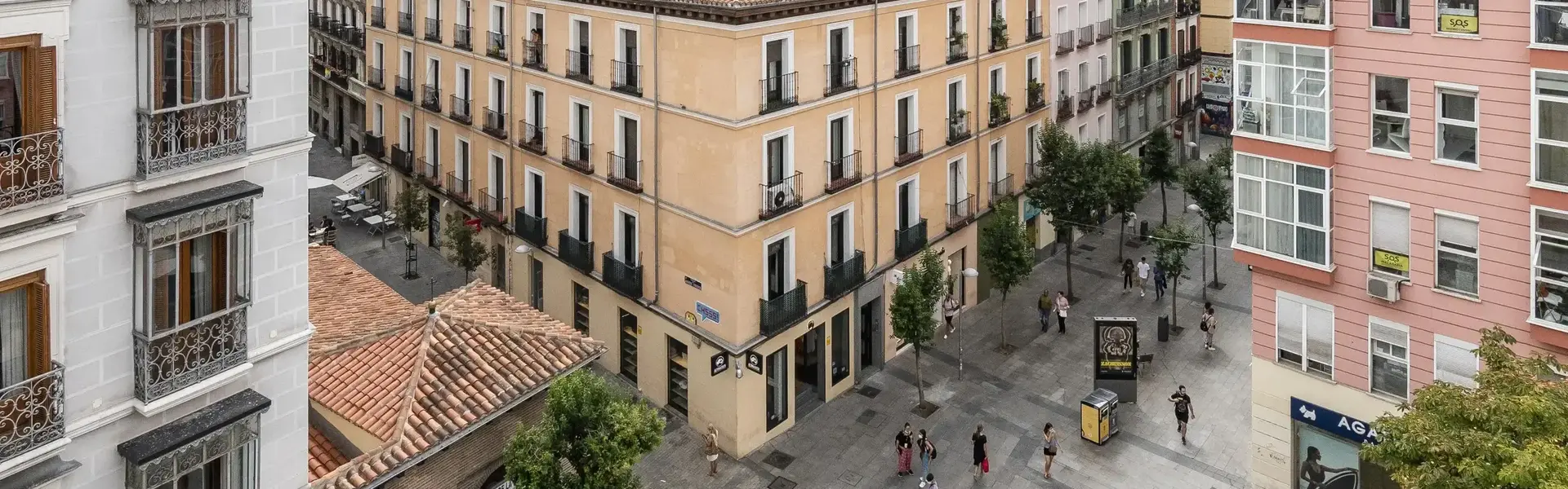 a group of people walking in a city
