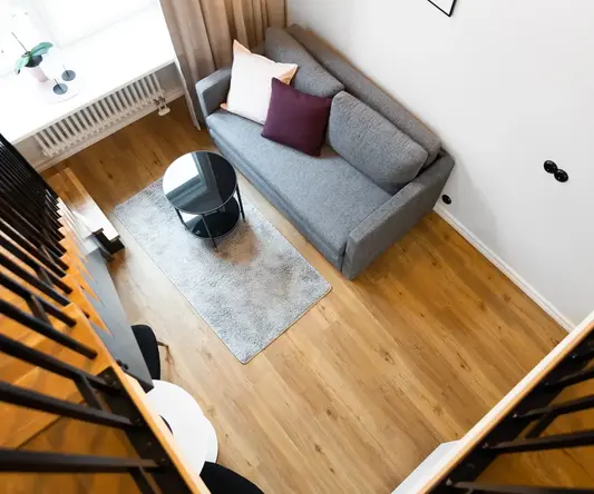 a living room with a couch and a table