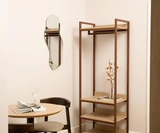 a shelf next to a mirror