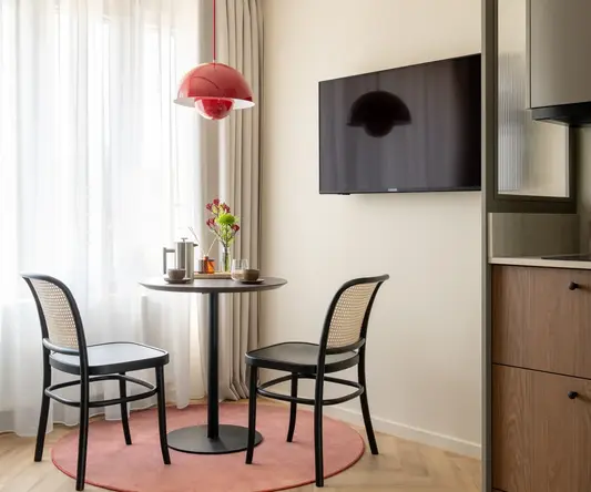 a table and chairs in a room