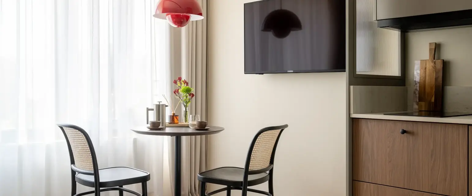 a table and chairs in a room