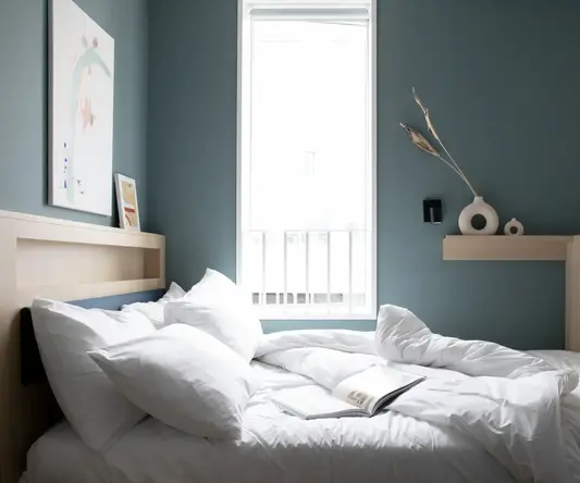 King sized bed near window