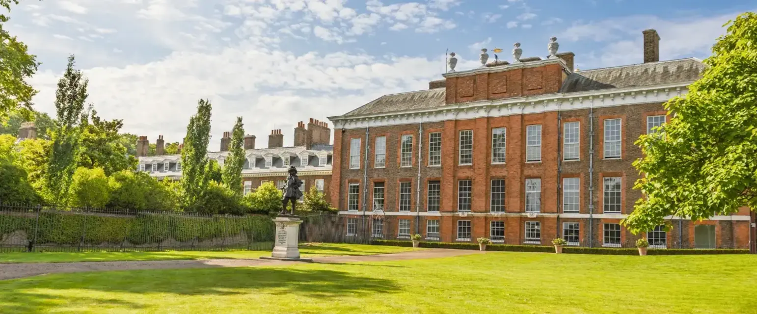 a statue in front of a building