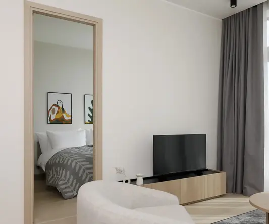 a room with a television and a bed