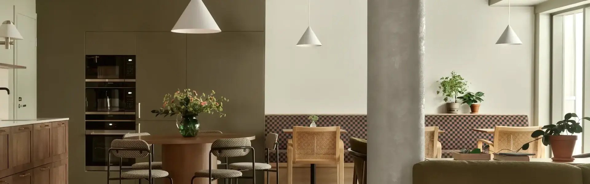 a room with a red chair and a table