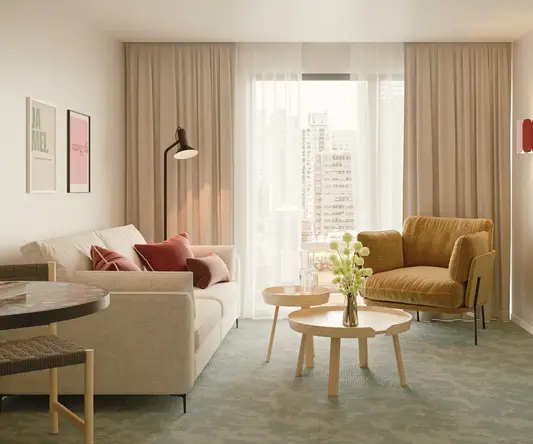 a living room with couches and a coffee table