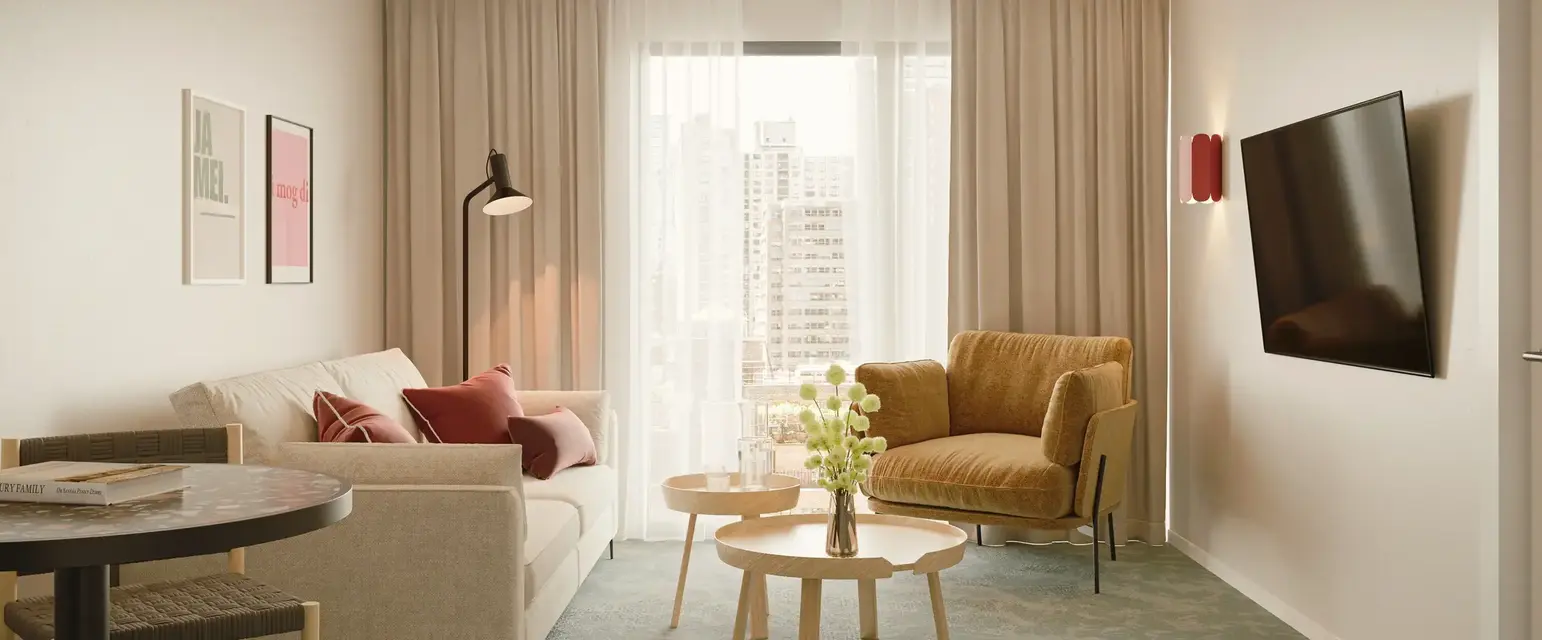 a living room with couches and a coffee table