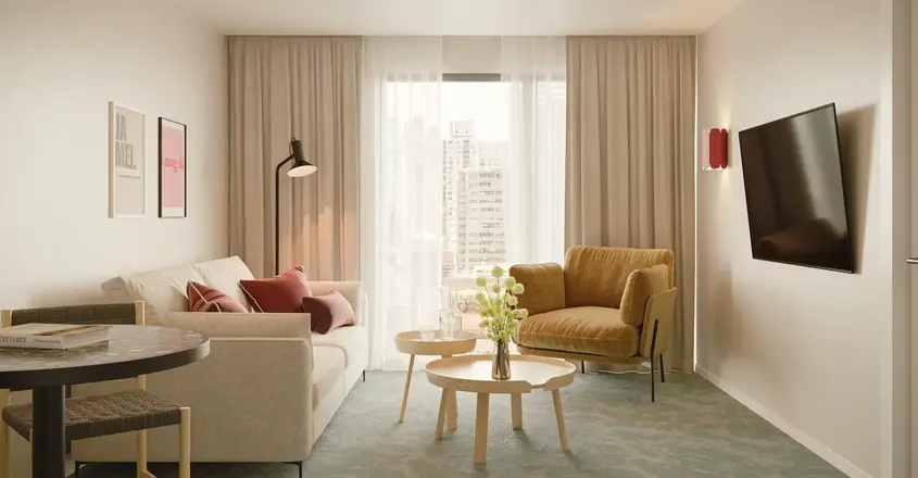 a living room with couches and a coffee table