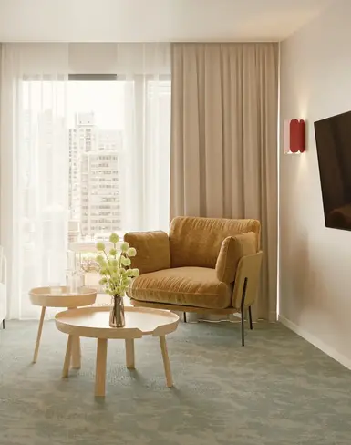 a living room with couches and a coffee table