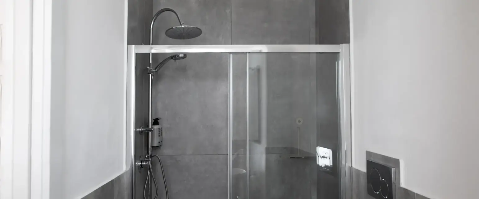 a shower with a glass door