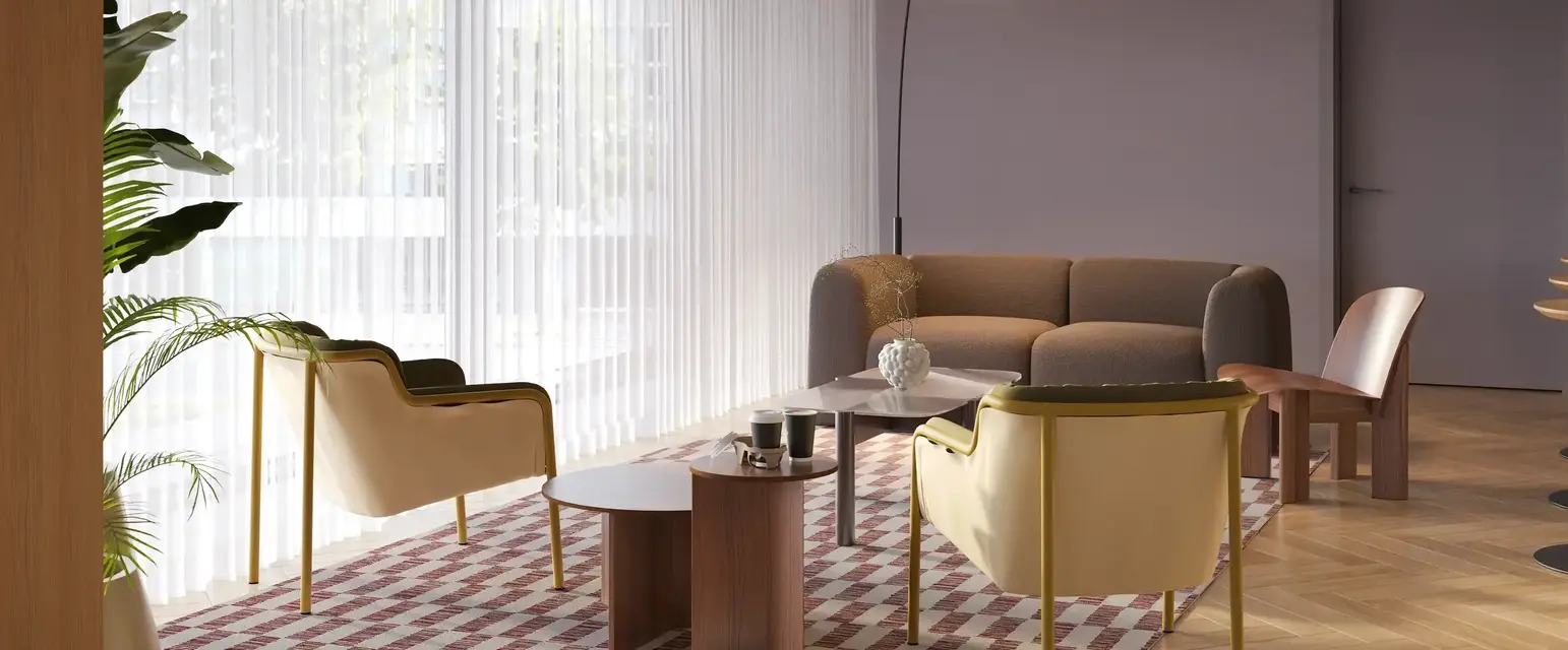a room with a couch and chairs