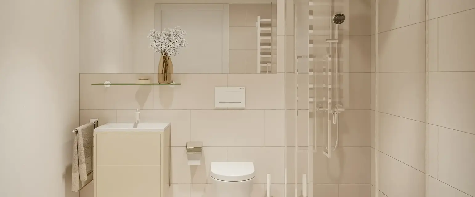 a bathroom with a glass shower and toilet