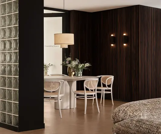 a room with a table and chairs