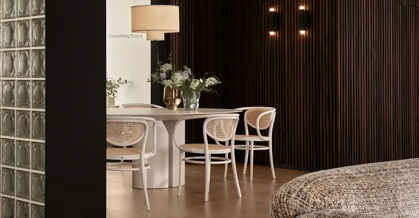 a room with a table and chairs