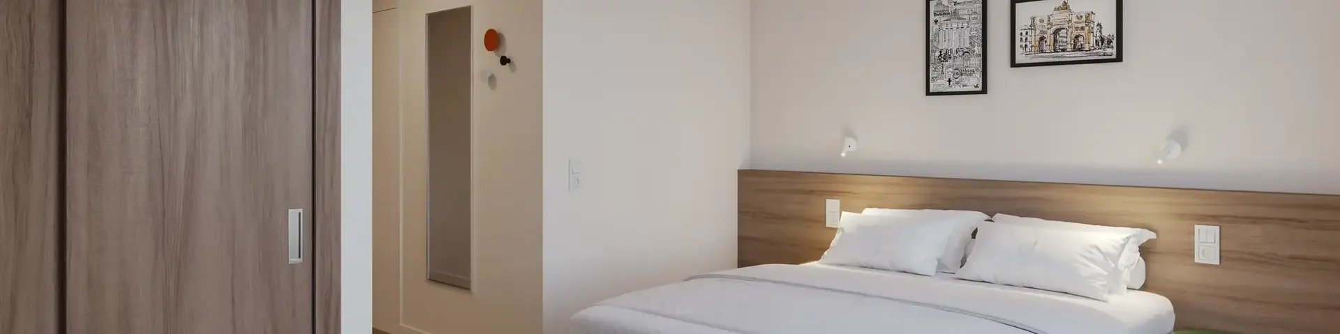 a bedroom with a bed and a round table