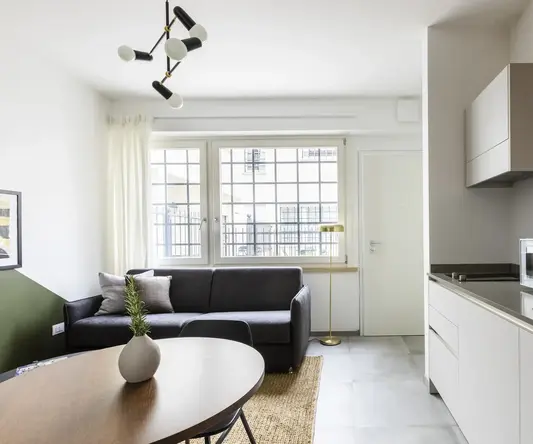 a living room with a couch and a table