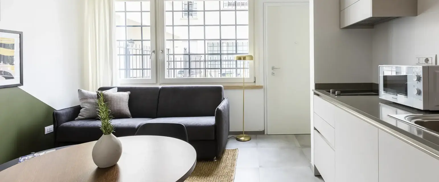 a living room with a couch and a table