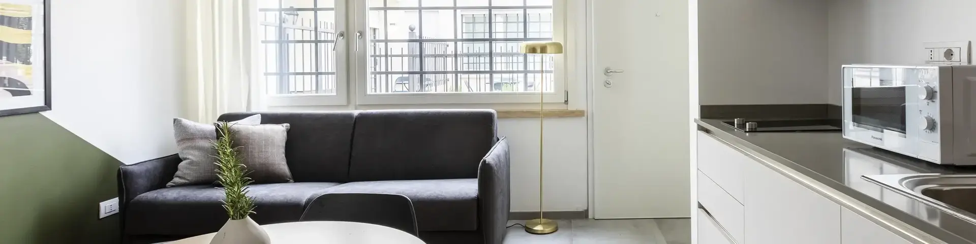 a living room with a couch and a table