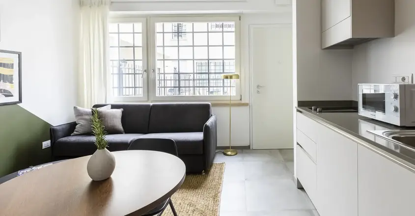 a living room with a couch and a table