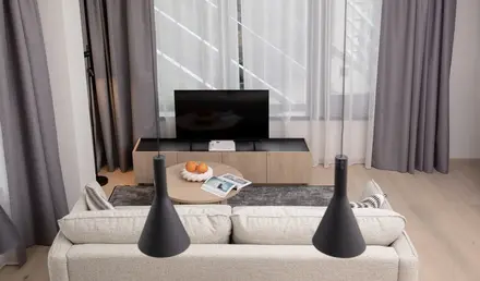 a living room with a couch and a tv