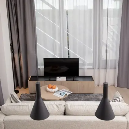 a living room with a couch and a tv