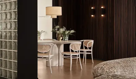 a room with a table and chairs