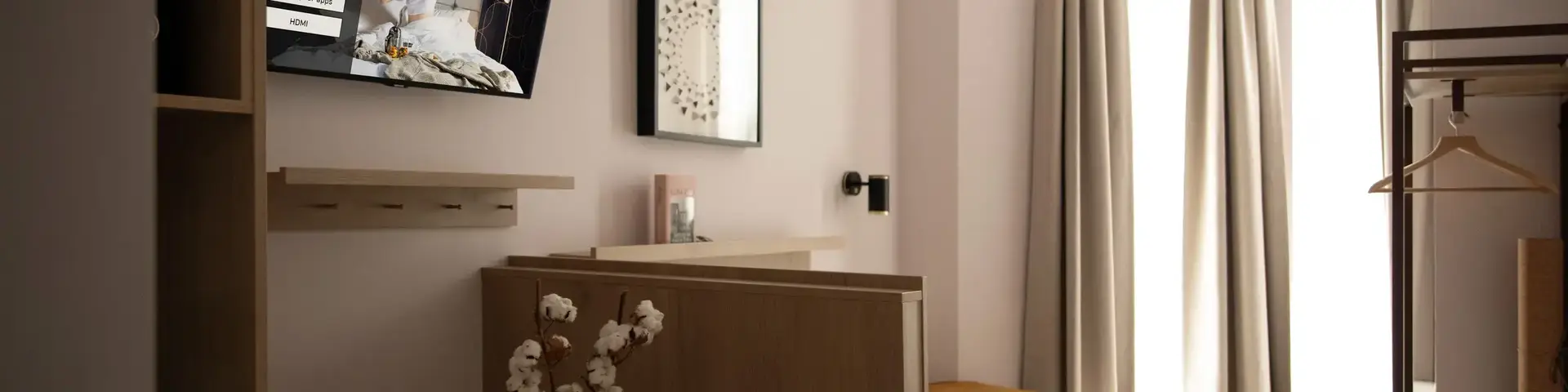 a room with a tv on the wall