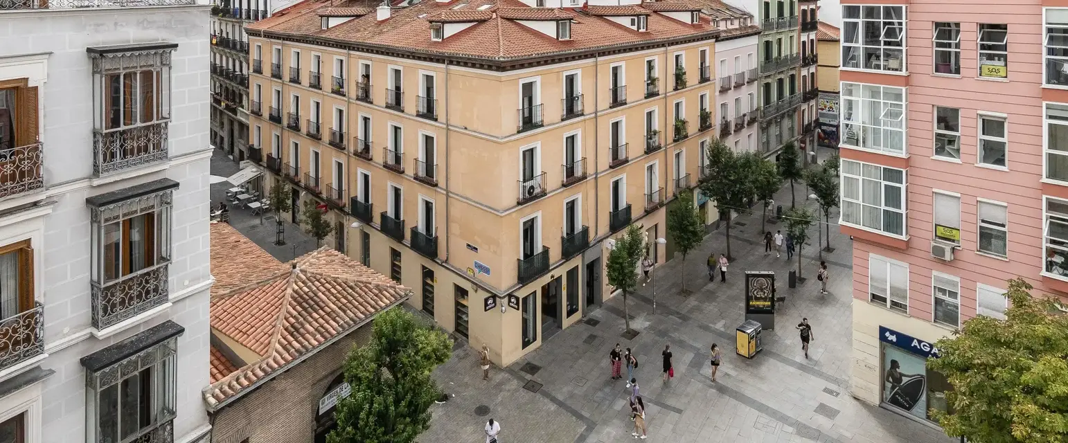 a group of people walking in a city