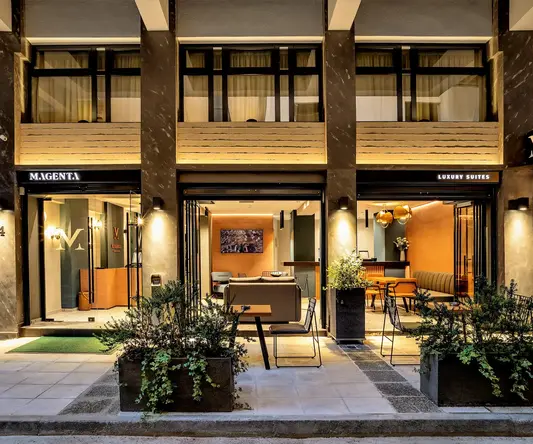 a building with a patio and tables