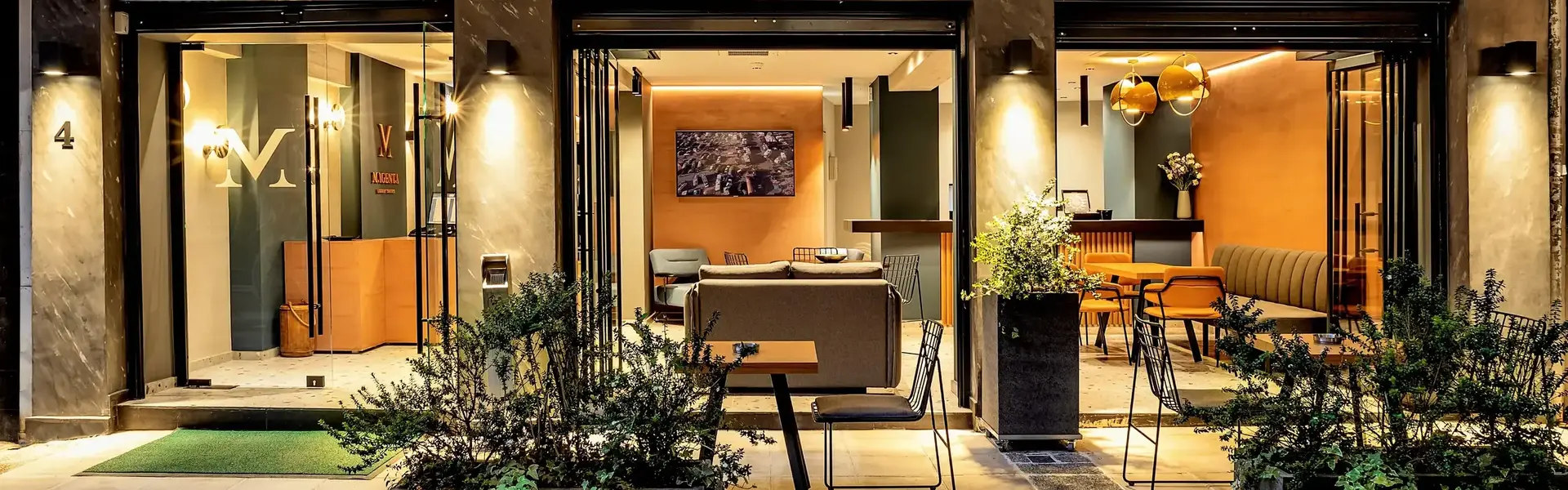 a building with a patio and tables