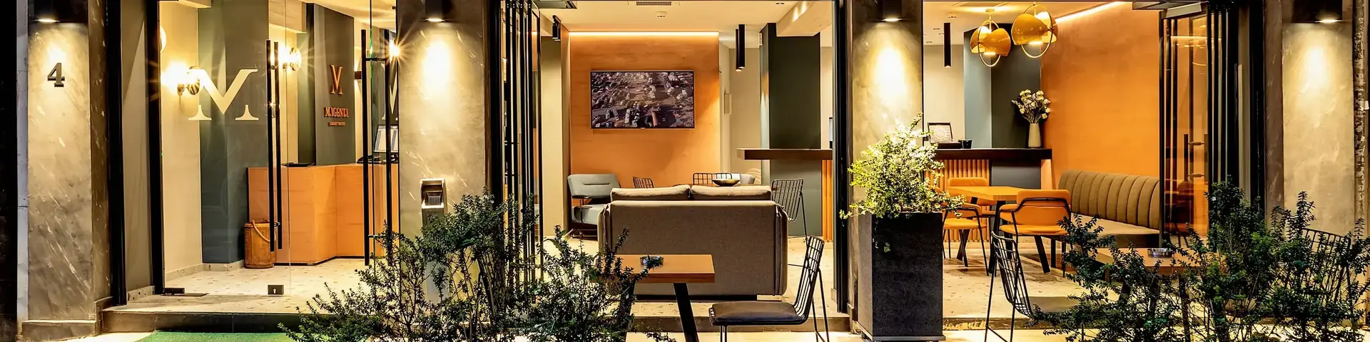 a building with a patio and tables