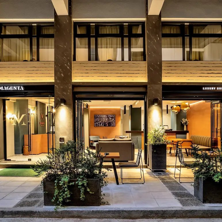 a building with a patio and tables