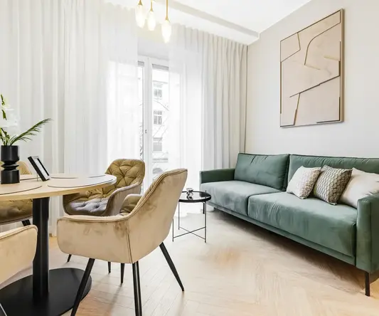 a living room with a couch and a table