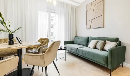 a living room with a couch and a table