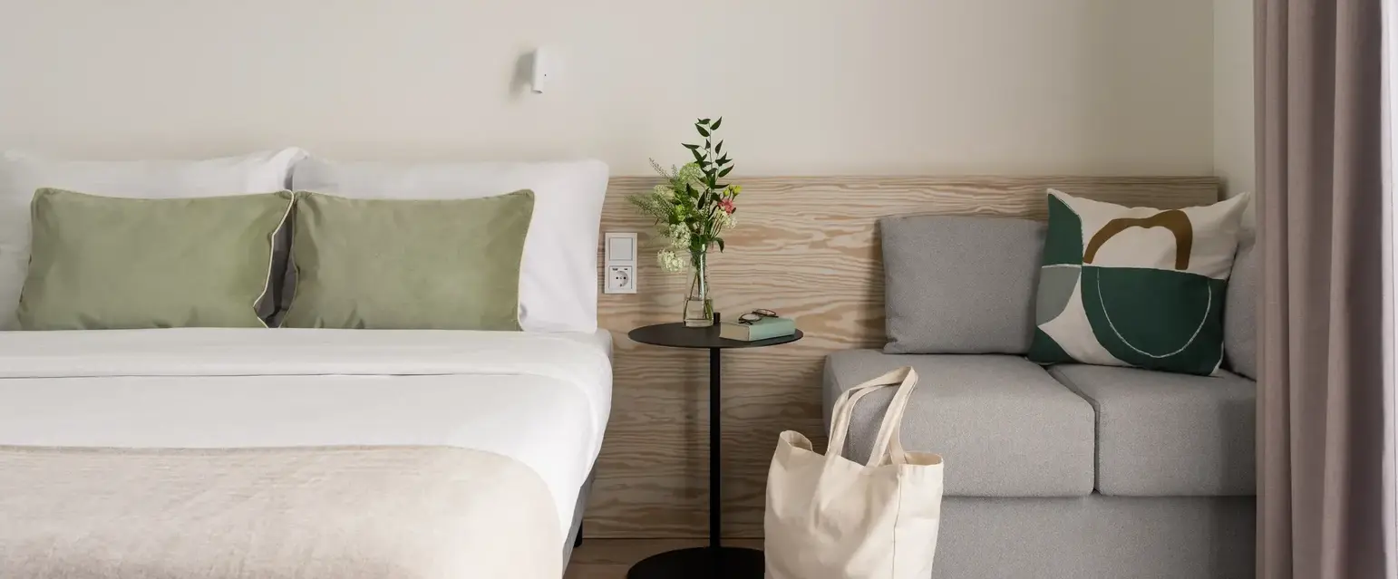 a bed and a couch in a room