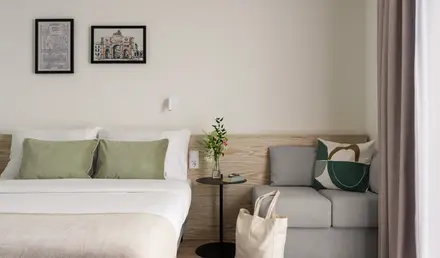 a bed and a couch in a room