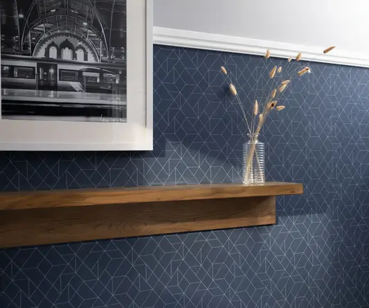 a shelf with a vase of flowers on it