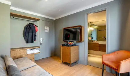 a room with a couch and a tv