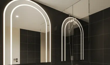 a bathroom with a mirror and sink