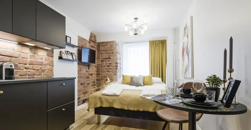 a room with a bed and a table