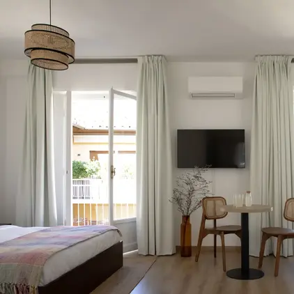 a room with a bed and a table