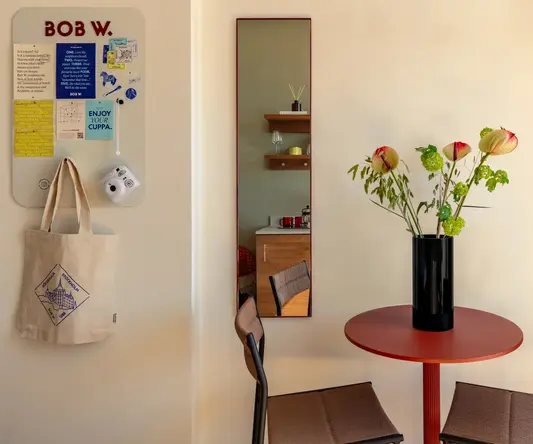 a vase of flowers on a table