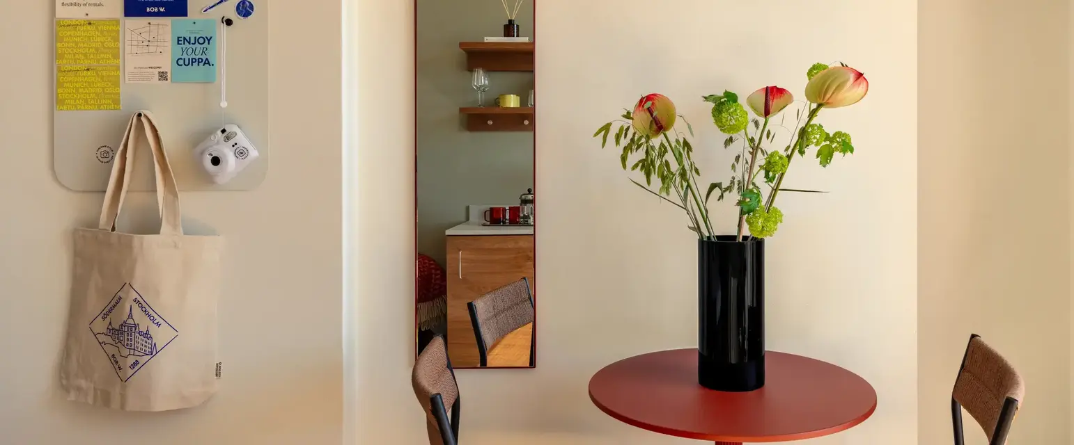 a vase of flowers on a table