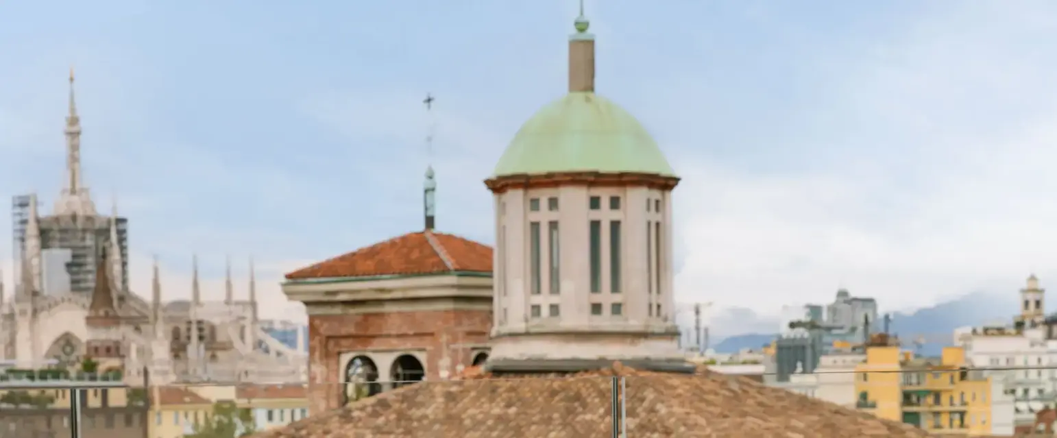 a table and chairs on a rooftop