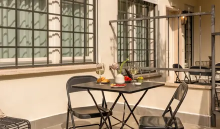 a table and chairs on a patio